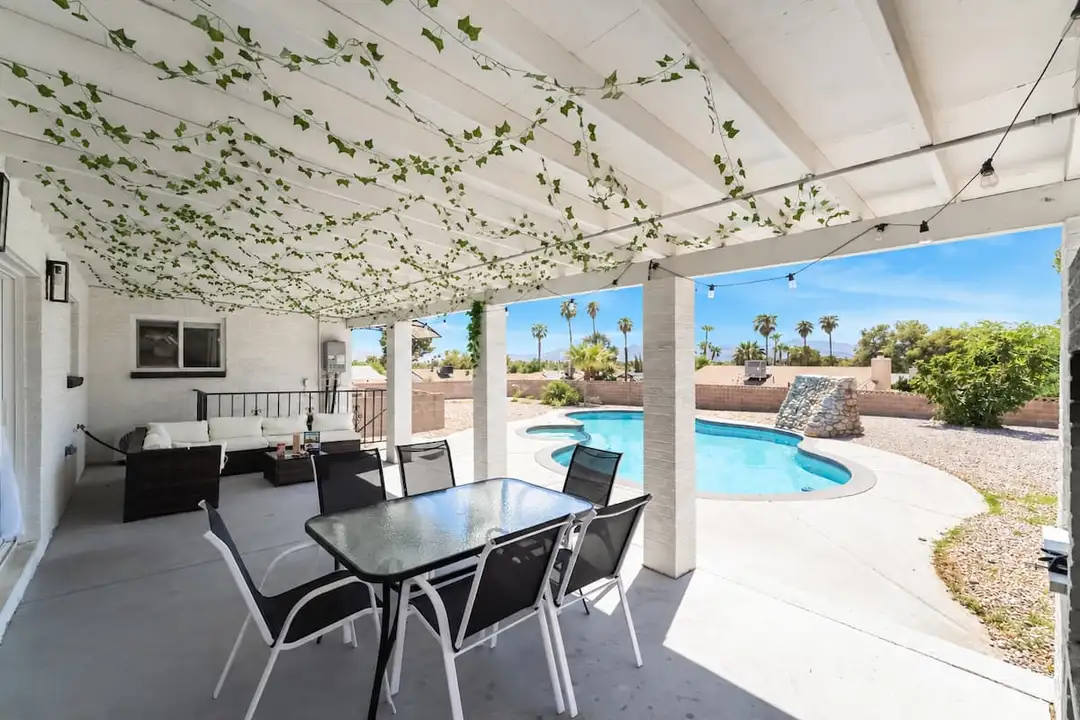 Outdoor dining beneath the patio cover